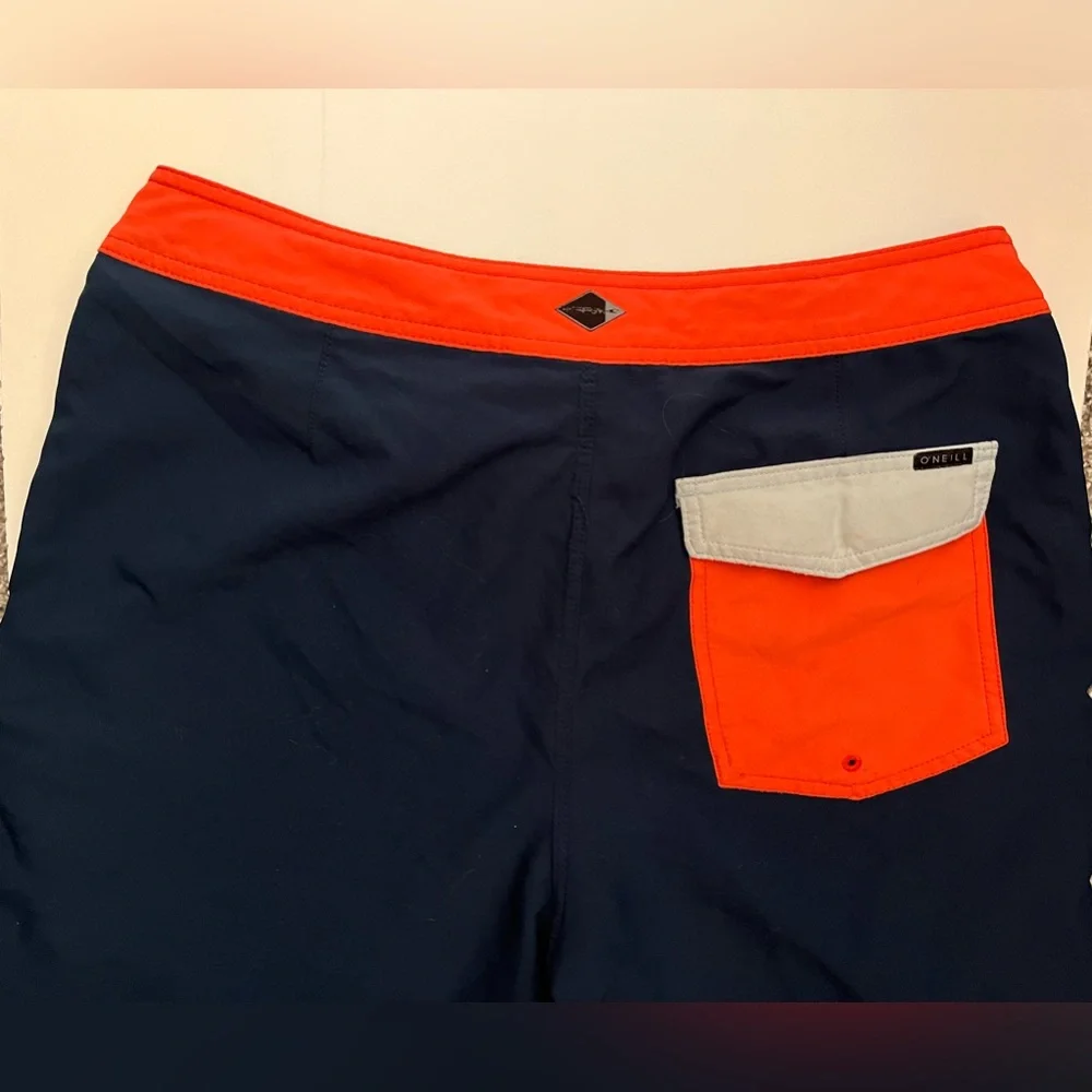 Men’s O’Neill Hyperfreak swim shorts, size 32 blue/orange/white summer surf